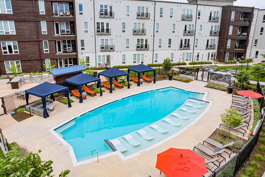 Enjoy a beautiful day at the pool, just like the one at Spark Apartments. Clear water pool located at Spark Apartments.
